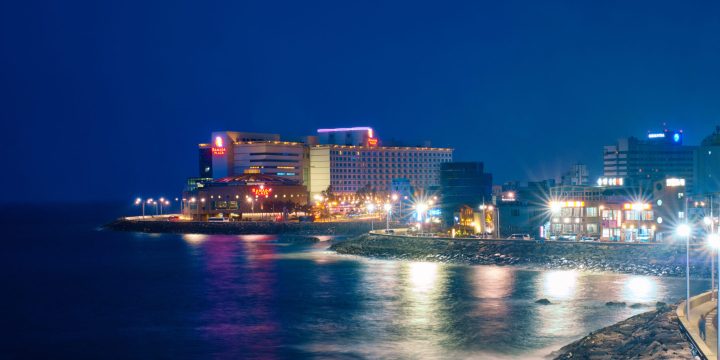 JEJU, SOUTH KOREA - APRIL 8, 2018: Jeju resort town illuminated in night, Jeju island, South Korea
